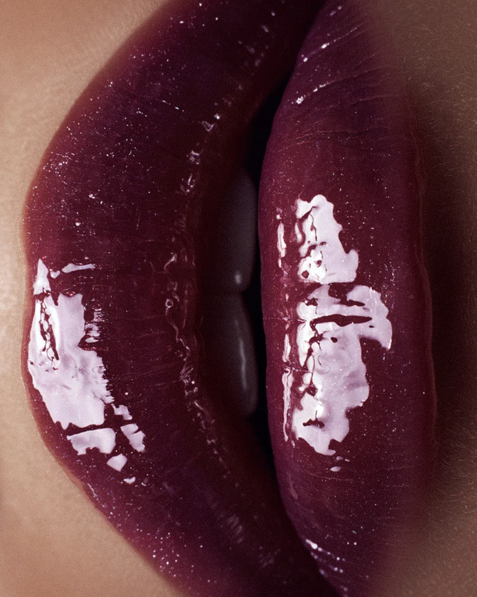 AI-generated macro of full lips in glossy plum