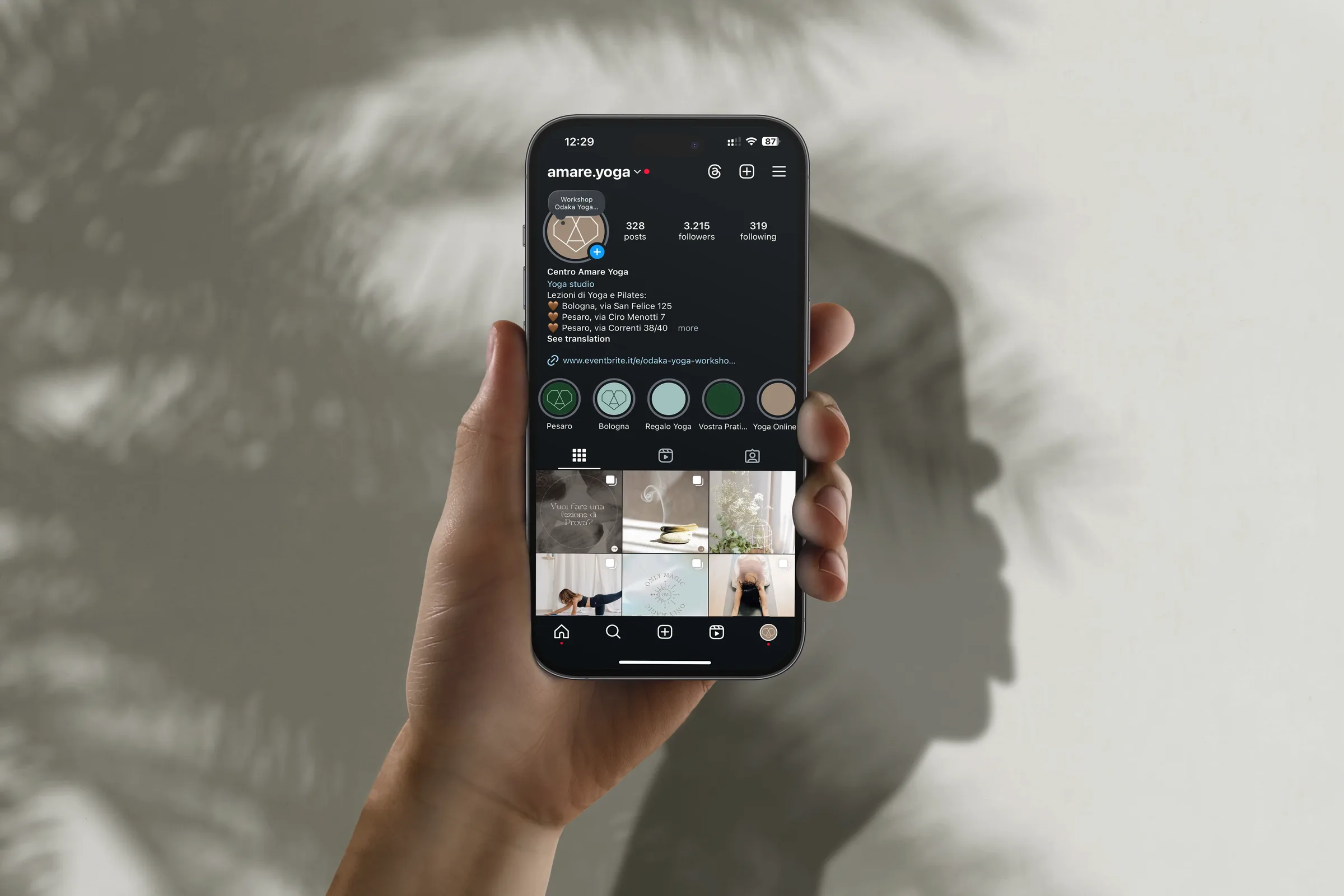 Amare Yoga Instagram profile on a smartphone