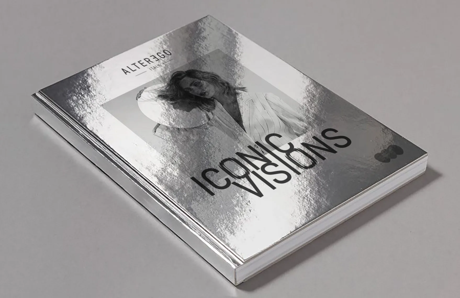 Iconic Visions lookbook with a silver foil cover