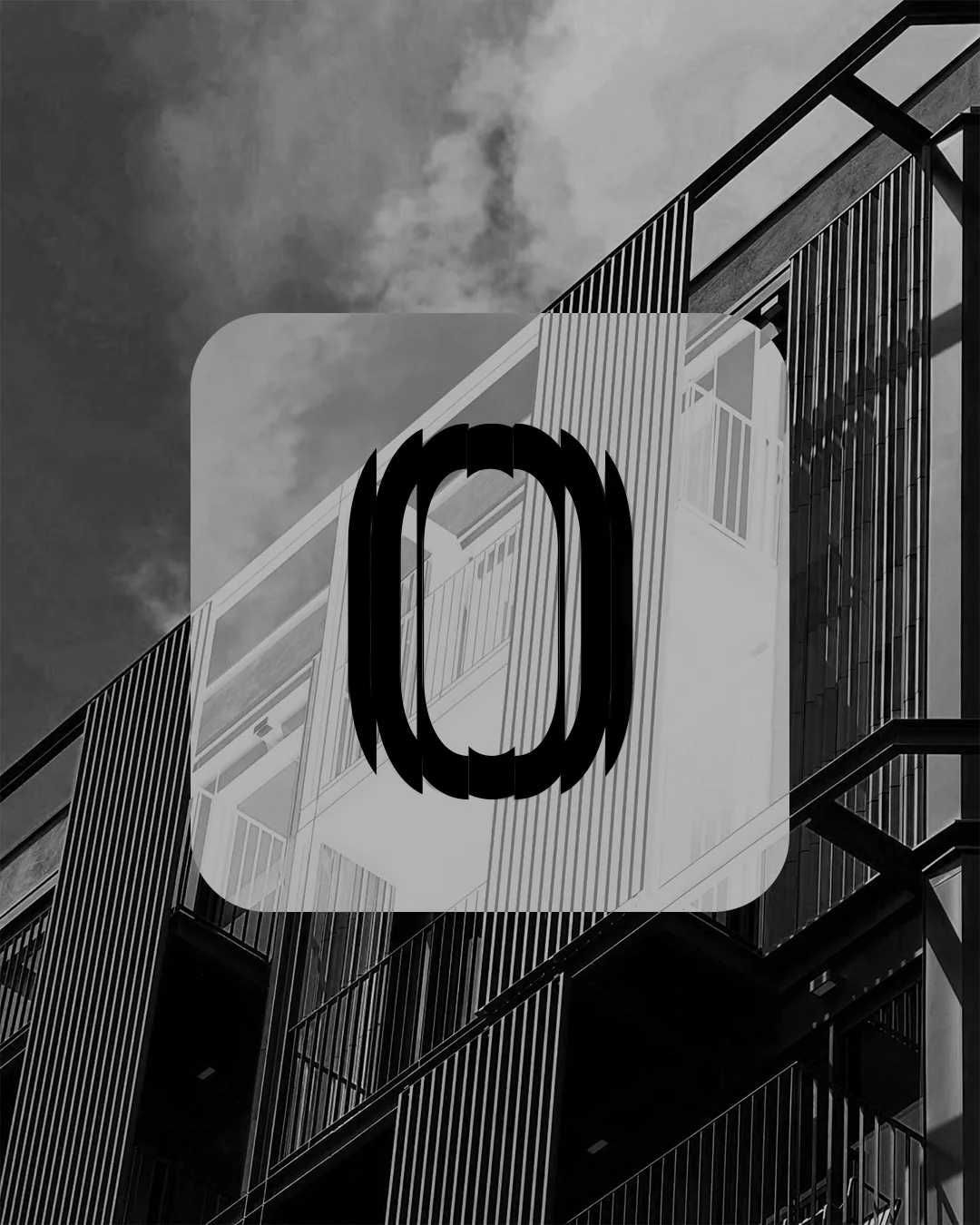 Iconic Visions campaign mark on a glass panel in front of a modern building