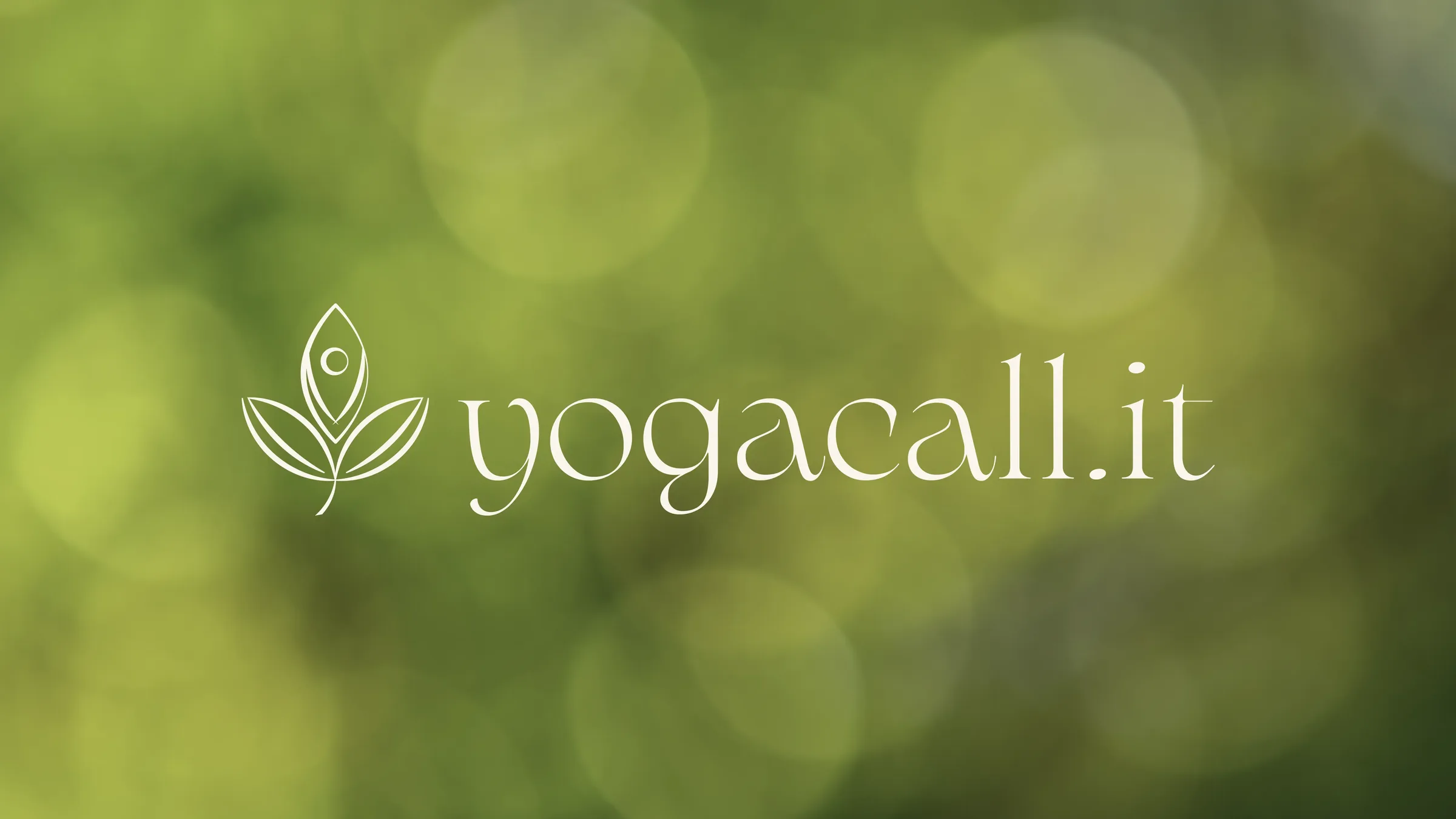 yogacall.it logo, a three-leaf sprout, on a blurred green background